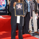 Whoopi Goldberg stands on the star she received on the famous Hollywood Walk of Fame Nov. 13, 2001, in Hollywood, Calif.